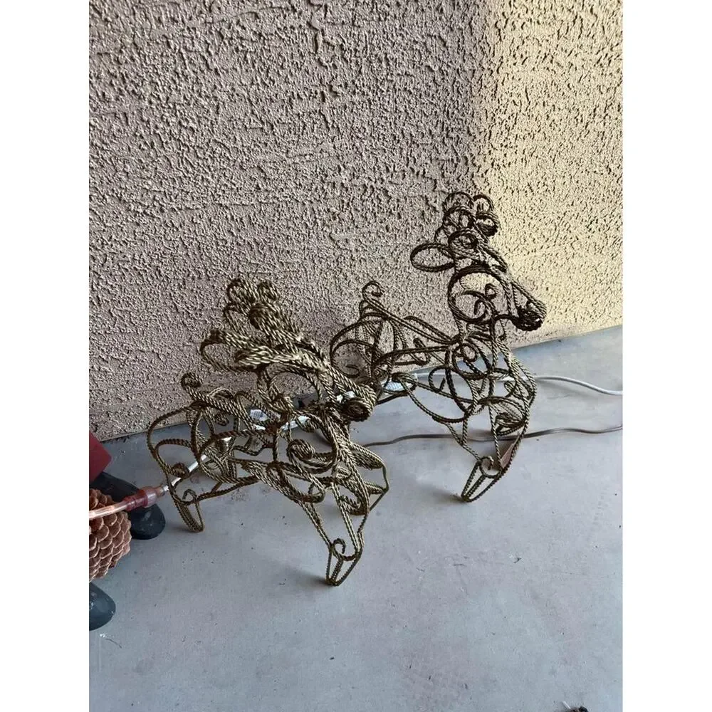 Two wrought iron Christmas Reindeer Gold filigree decorations